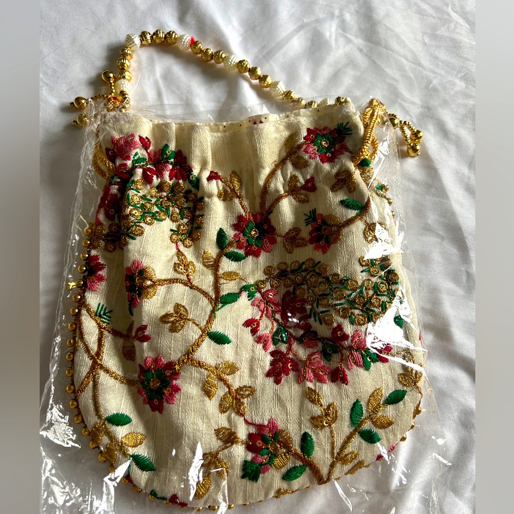 Hand embroidered potli bag